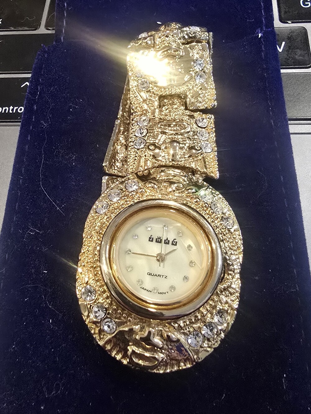 Gold Tone Jeweled Pendant Watch with Cream Dial